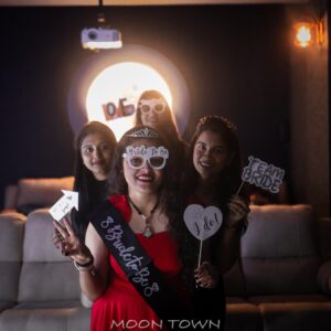 Guests celebrating special occasions at Moon Town Private Theatre, luxury private theatre and celebration venue in Bangalore